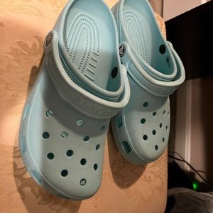 Teal blue original crocs and pink flamingo crocs flops